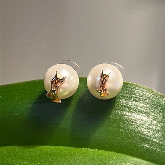 Yves Saint Laurent Jewelry - YSL Stud Earrings with sizing difference